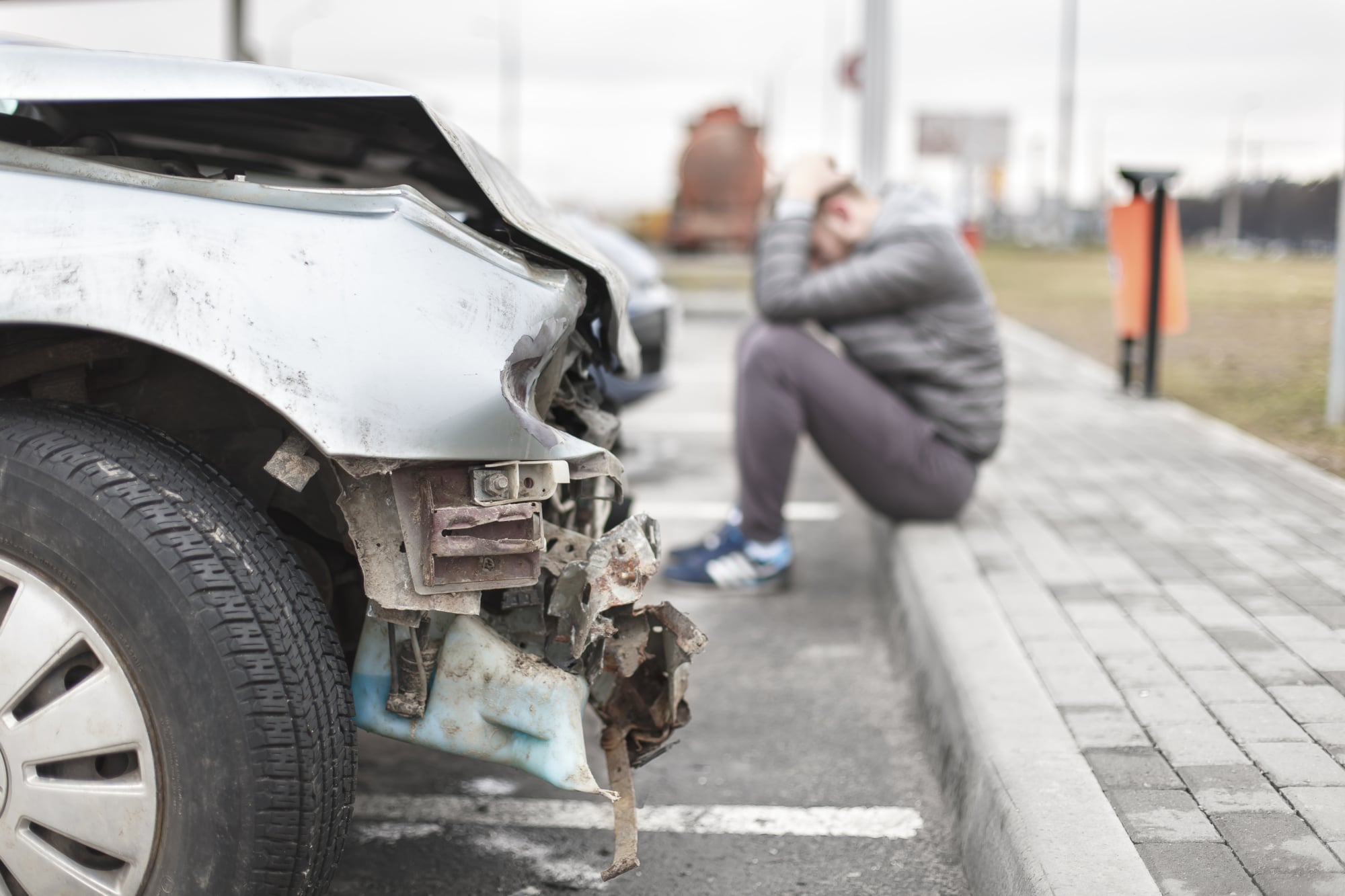 a man stressed after a car accident in Bangor, ME