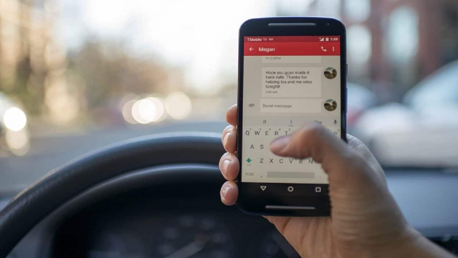 Texting while driving stock photo